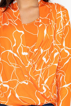 Carraig Donn Cross Over Top in Orange Print