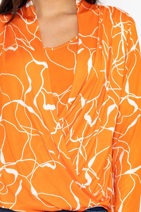 Carraig Donn Cross Over Top in Orange Print