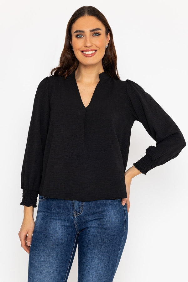 Carraig Donn Long Sleeve Collarless Top in Black