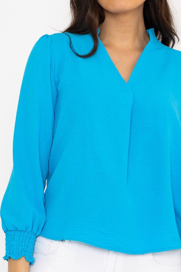Carraig Donn Long Sleeve Collarless Top in Blue