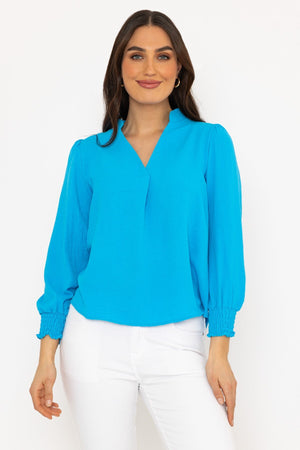Carraig Donn Long Sleeve Collarless Top in Blue