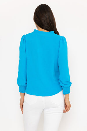 Carraig Donn Long Sleeve Collarless Top in Blue