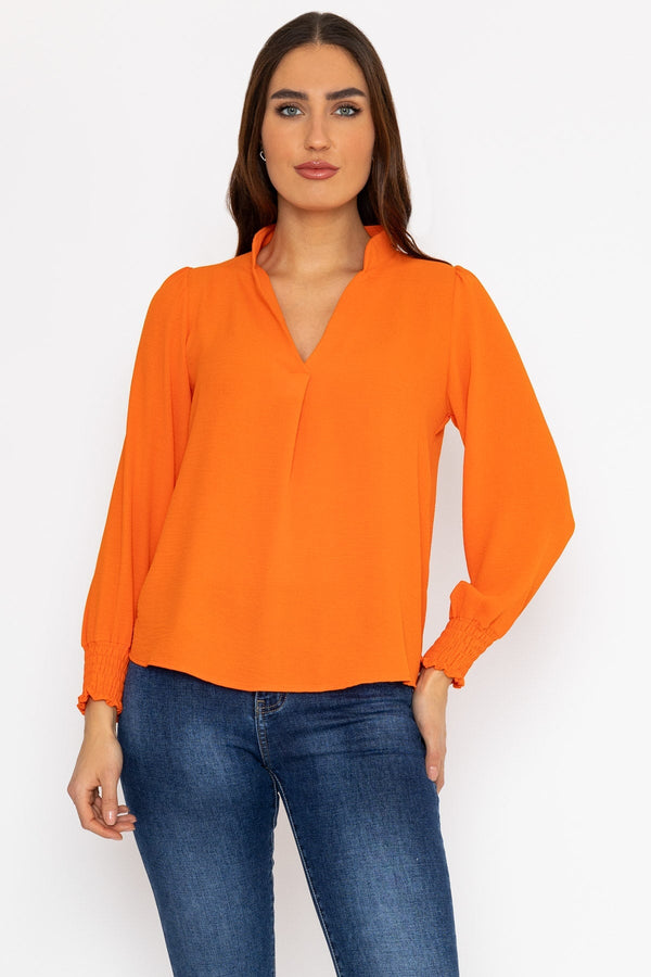 Carraig Donn Long Sleeve Collarless Top in Orange