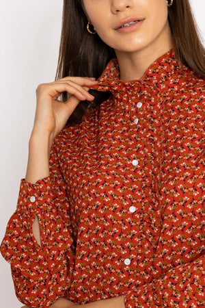 Carraig Donn Ruffle Blouse in Rust Print
