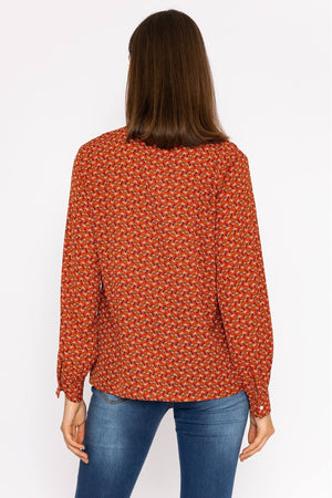 Carraig Donn Ruffle Blouse in Rust Print